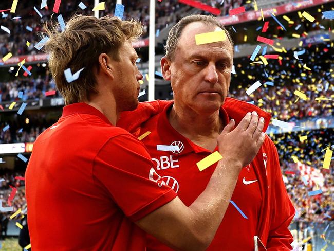 Sydney Swans captain Callum Mills and coach John Longmire leave the field after losing to the Brisbane Lions in the 2024 AFL Grand Final at the MCG on September 29, 2024. Photo by Phil Hillyard(Image Supplied for Editorial Use only - **NO ON SALES** - Â©Phil Hillyard )