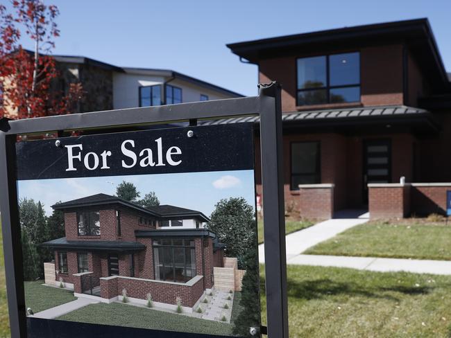 FILE - In this Oct. 22, 2019, photo a sign stands outside a new home for sale in southeast Denver. On Thursday, Oct. 31, Freddie Mac reports on this weekâ€™s average U.S. mortgage rates. (AP Photo/David Zalubowski, File)