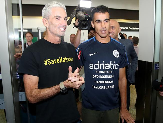 After his shocking ordeal, Hakeem Al-Araibi, pictured with Australian football identity Craig Foster, has become the most well-known face in the NPL. Picture: Getty Images