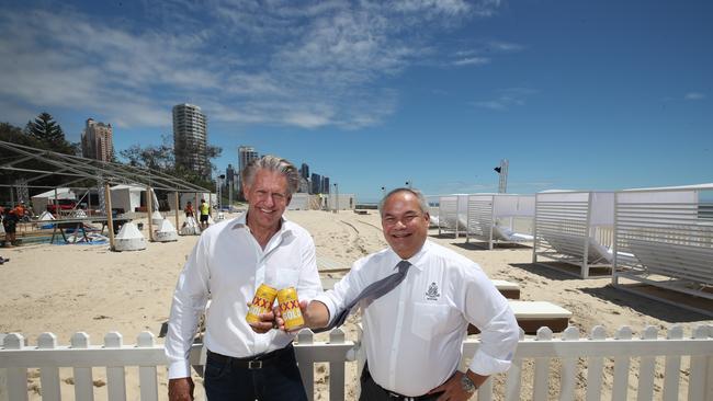 Australian Venue Co chair Bob East and Gold Coast Mayor Tom Tate toast and inspect the under-construction bar. Picture: Glenn Hampson