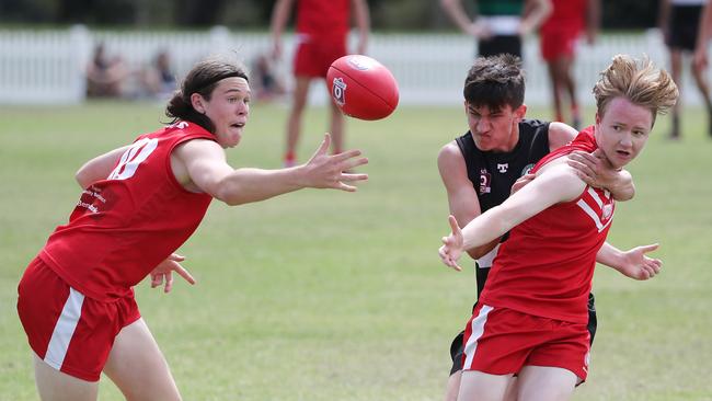 Palm Beach Currumbin SHS's Macklin Johnston grabs the ball from Park Ridge State High. Pic Peter Wallis