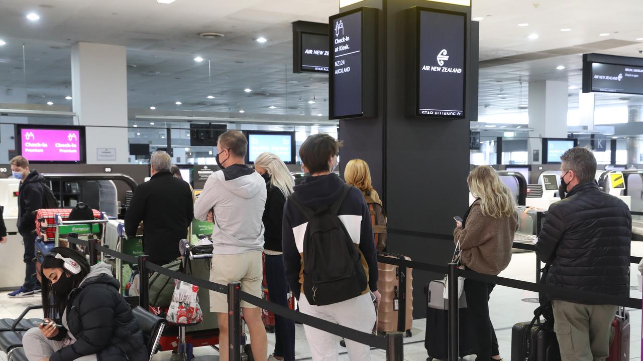 The New Zealand travel bubble has reopened with Victoria as people queue to fly out on Monday. Picture: David Crosling