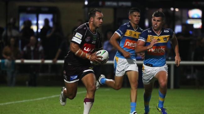 Burleigh Bears player Hayden Schwass attacks the Gold Coast Titans line during a pre-season trial at Pizzey Park. February 20, 2021. Photo Jason O'Brien