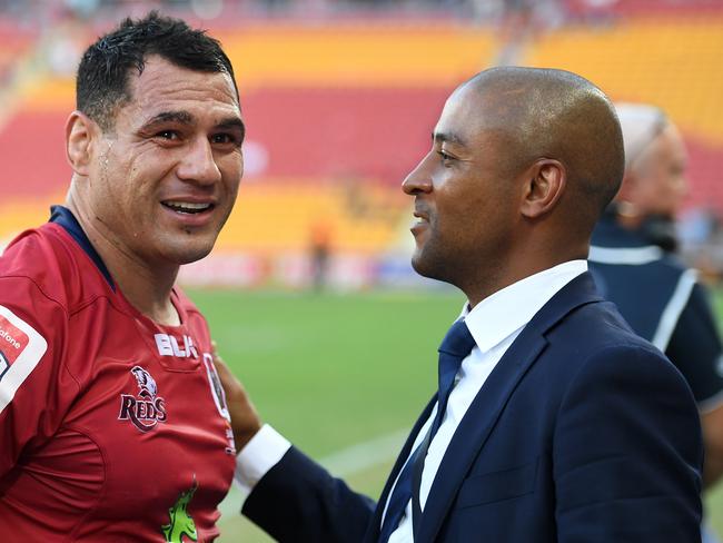 George Gregan (right) has a word with George Smith. Picture: AAP