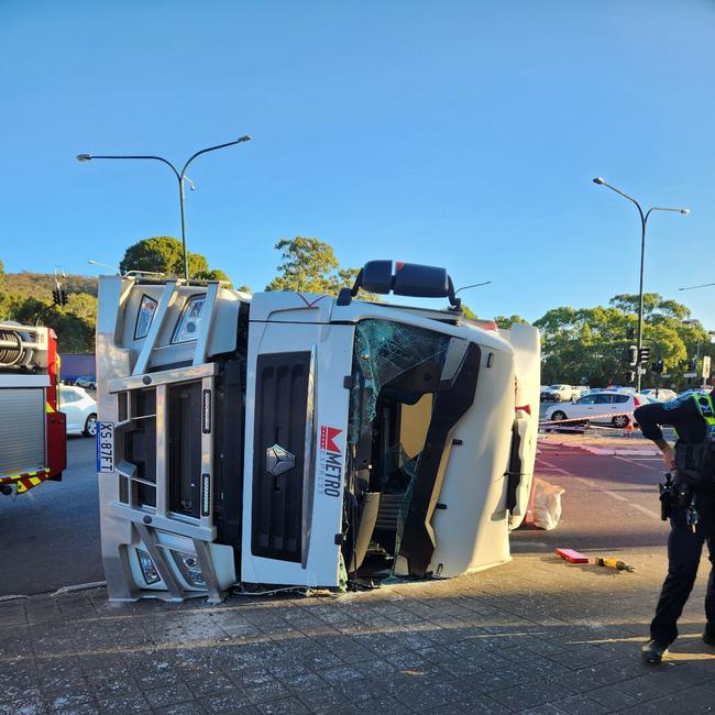 A truck has rolled at the base of the southeastern freeway, with no reports of serious injury.