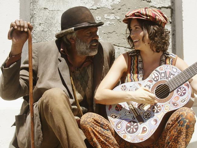 Ernie Dingo and singer Missy Higgins in a scene from the 2009 film <i>Bran Nue Dae</i>. Picture: Supplied