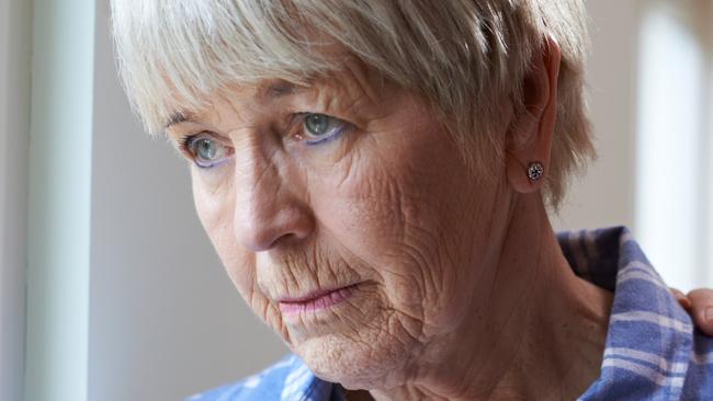 Serious Senior Woman With Adult Daughter At Home