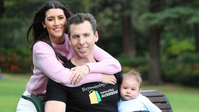 Olympic swimming champion Grant Hackett with his fiance Sharlene Fletcher and their baby boy Edward. Grant Hackett is the face of Buy Aussie Now day. Picture: Alex Coppel.