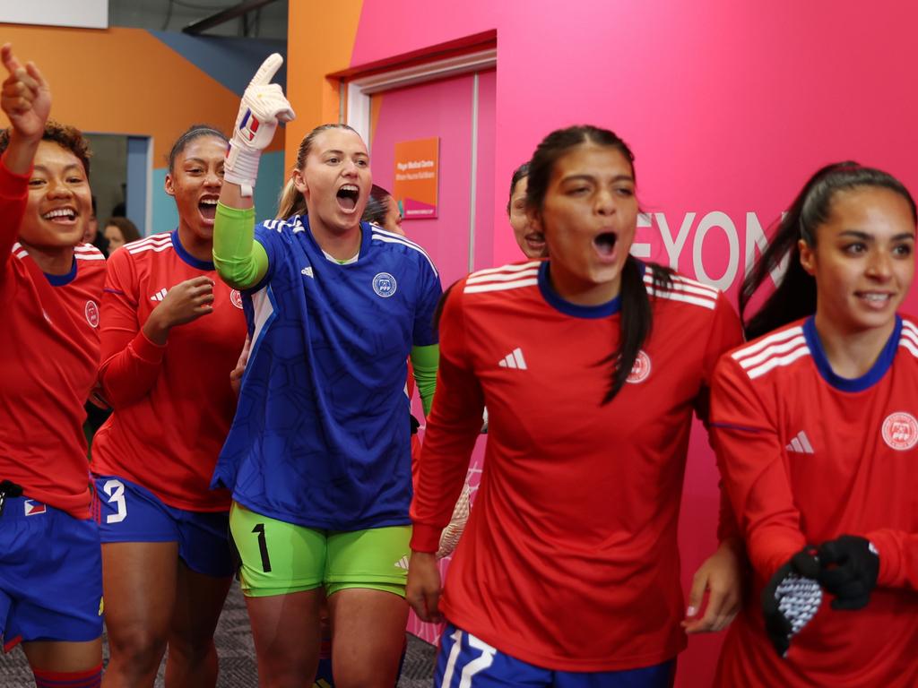 Philippines players cheer in the tunnel ahead of their warm up prior to their game against Switzerland in Dunedin. Picture: Matthew Lewis/Getty Images