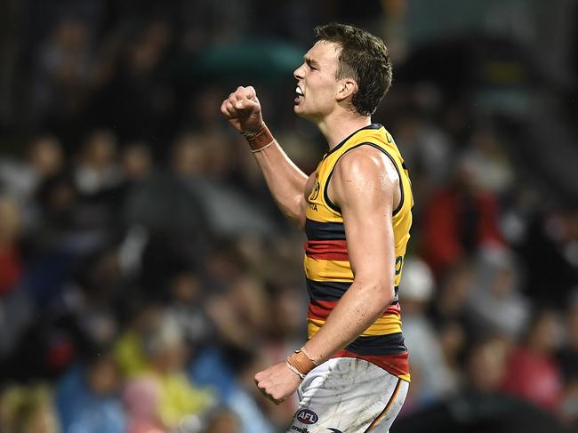 CAIRNS, AUSTRALIA - JUNE 12: Riley Thilthorpe of the Crows celebrates a goal during the round 13 AFL match between the St Kilda Saints and the Adelaide Crows at Cazaly's Stadium on June 12, 2021 in Cairns, Australia. (Photo by Albert Perez/AFL Photos/via Getty Images)