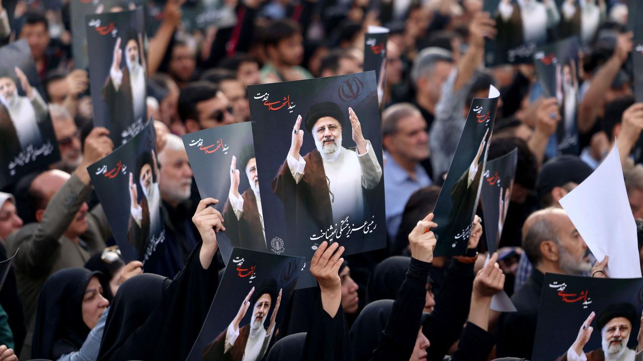 Iranians gather at Valiasr Square in central Tehran to mourn the death of President Ebrahim Raisi. Picture: Atta Kenare / AFP