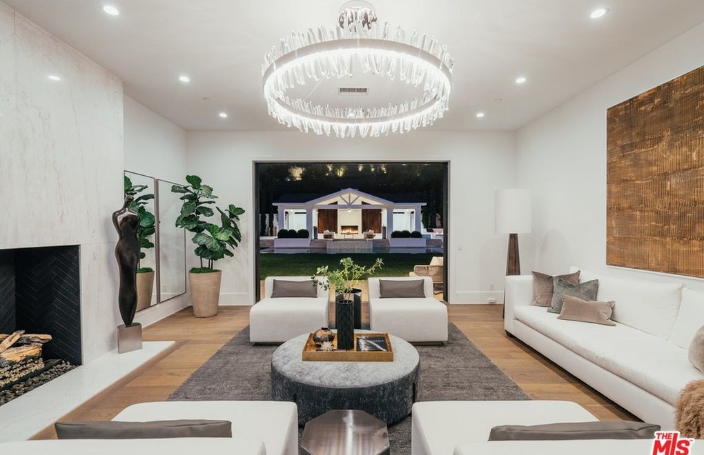 A living space that opens out to the pool area. Picture: Realtor