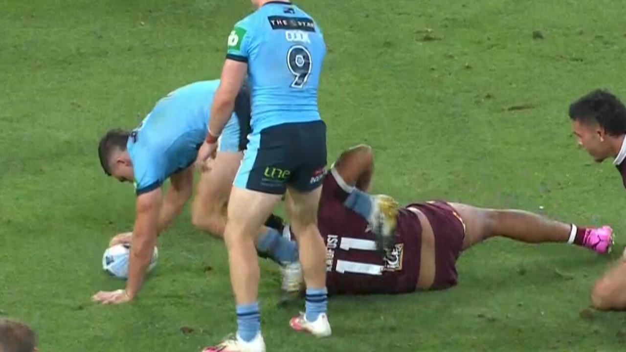 Nathan Cleary has his leg pulled by Felise Kaufusi in the final two minutes.