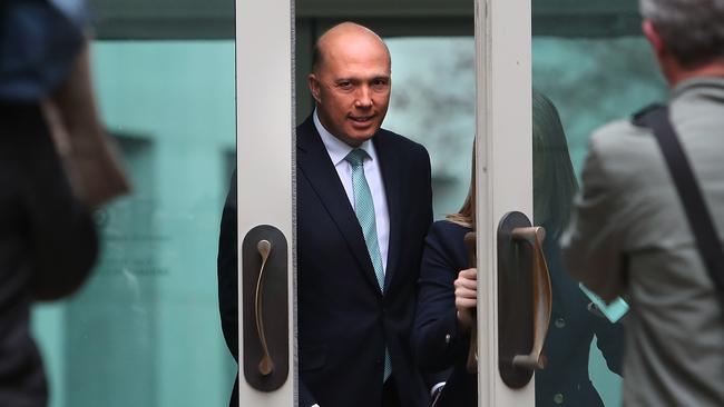 Smiling assassin? Peter Dutton holds a press conference this morning to call for a new party room meeting. Picture: Kym Smith