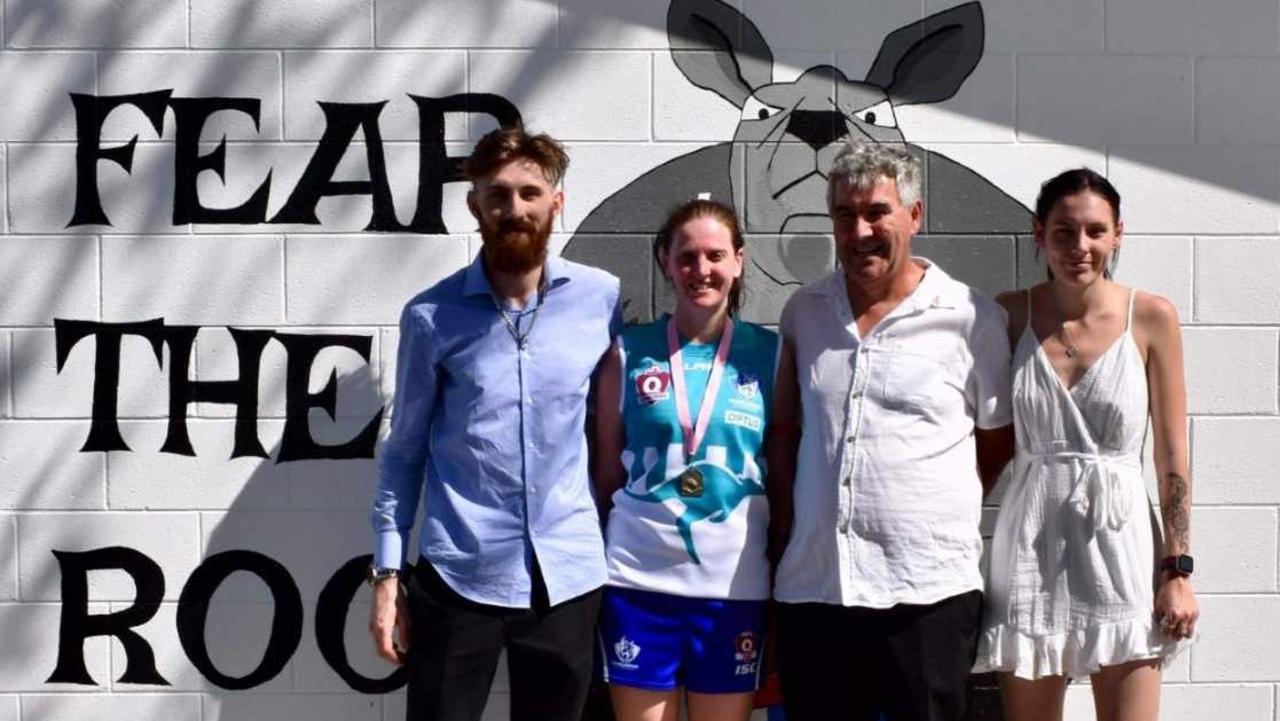 Brothers women’s co-captain Leilani Nelson received the Judy Christian Memorial Medal from Judy's family members - husband Lucas and children Shaun and Peta.