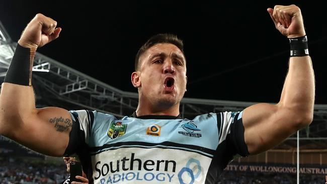 SYDNEY, AUSTRALIA — OCTOBER 02: Chris Heighington of the Sharks celebrates winning the 2016 NRL Grand Final match between the Cronulla Sharks and the Melbourne Storm at ANZ Stadium on October 2, 2016 in Sydney, Australia. (Photo by Mark Kolbe/Getty Images)