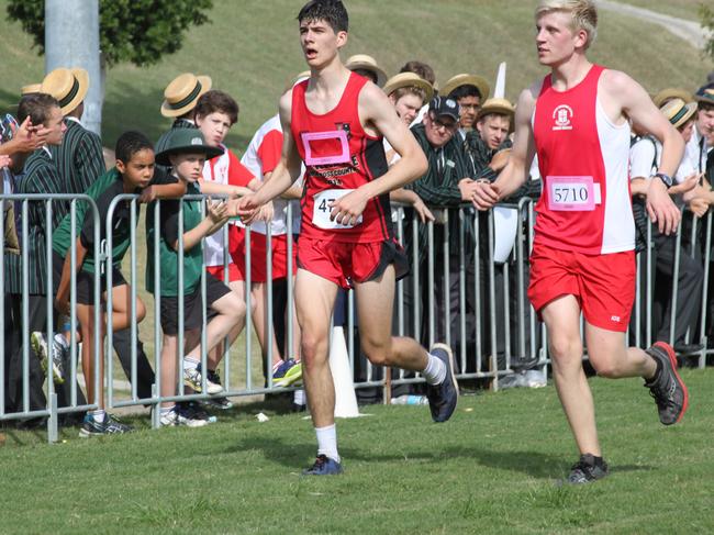 Technology, camping, sporting and capital works are some of the additional fees and levies, which hit parents with another hip-pocket pinch ranging from about $30 to more than $1,000. Pictured: Terrace student Oliver Wightman and Ipswich Grammar School’s Jack Chivers during the GPS Cross Country Championships in Ipswich on June 4.