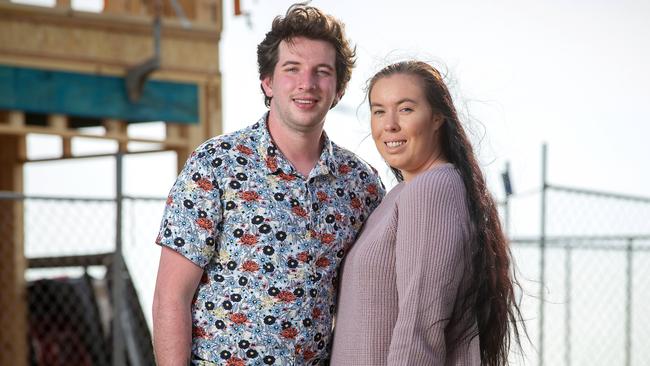 Maddy Hall, 24, and partner Sam Walters, 23, purchased their first house and land package for about $650,000. They have opted for a variable rate home loan. Picture: Mark Stewart.