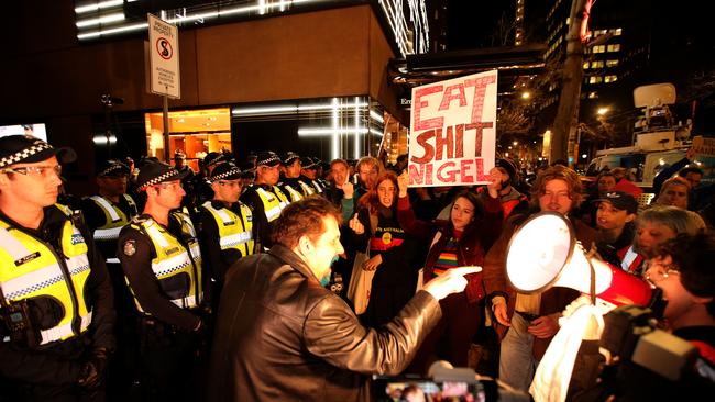 07/09/2018: Police try to separate protesters and supporters at a Nigel Farage speech at the Sofitel hotel in Melbourne. Stuart McEvoy/ The Australian.