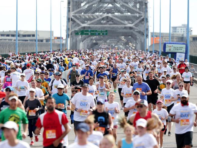 Sunday Mail Bridge to Brisbane. Runners make there way across Story Bridge.  (AAP Image/Mark Calleja)