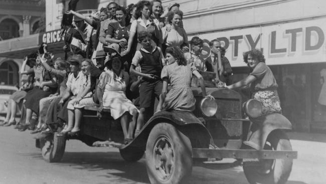 Mackay residents celebrating victory over Japan on August 13, 1945, outside of the former Lambert's Economic Stores. Picture: Contributed