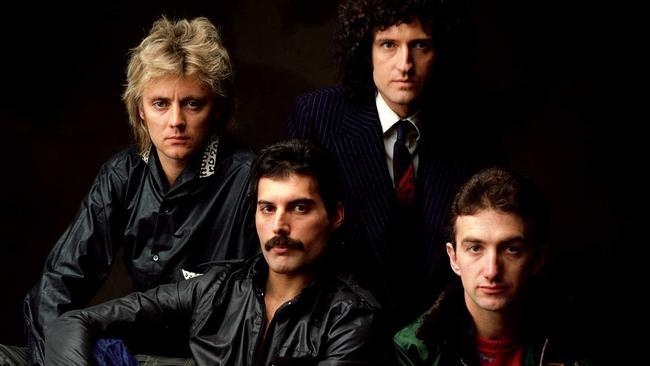 Freddie Mercury with the other members of Queen.