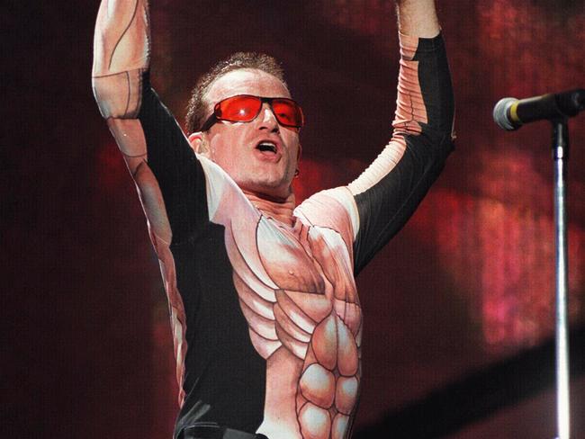 Bono performs in a "pecs" shirt during U2’s PopMart concert at SFS in 1998. Picture: News Corp Australia