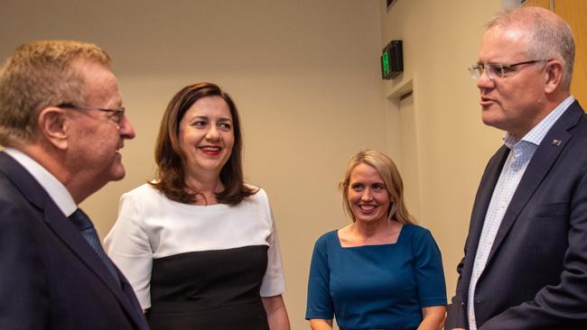 Prime Minster Scott Morrison (second from right) greets Australian Olympic Committee President John Coates, Queensland Premier Annastacia Palaszczuk and Tourism Minister Kate Jones before a meeting at the Cairns Convention Centre. Picture: AAP/Brian Cassey