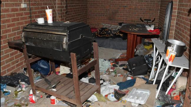 Squatters were using a barbecue in western Sydney unitblock garage.