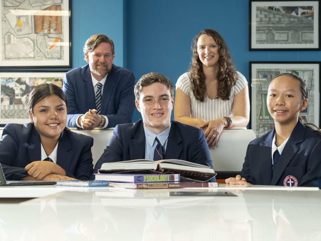 Thomas Hassall Anglican College students Stephanie Lopes, Even Boyle and Rochelle Gunawan with teachers David Butler and Millie Pettett. Picture: Matthew Vasilescu