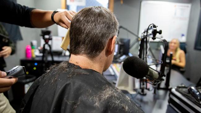 What is left of the Chief's mullet after a quick snip in the Hot 100 studio. Picture: Floss Adams.