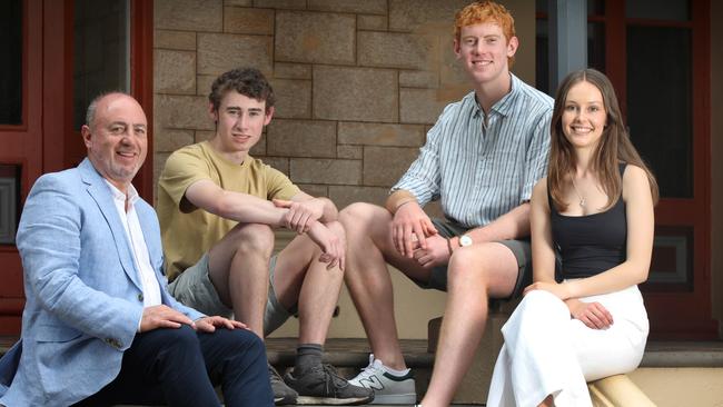 Pembroke Principal Mark Staker is pictured with some of the best performing IB students from his school Charles Newbold, Everett Webb and Elsie Holland. Picture: Dean Martin