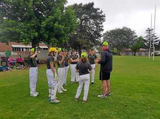 GROWING THE GAME: Coach Anthony Clark gives his players a few last-minute pointers before their match. The Toowoomba Girls Cricket Hub will host a come and try day on August 26. Picture: Contributed