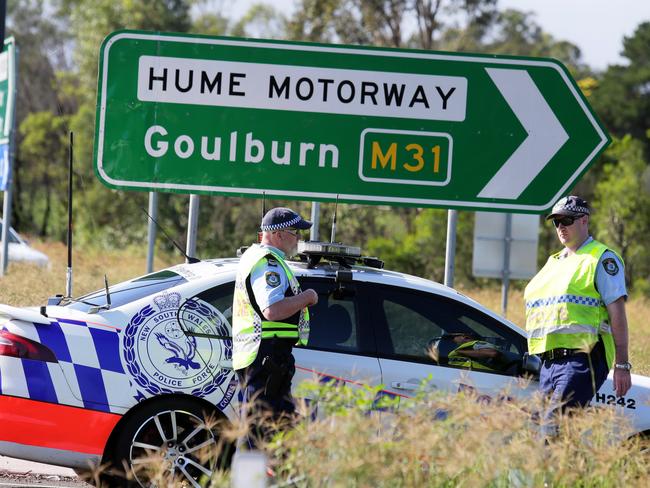 Police at Pheasants Nest, near Picton Road, on the highway. Picture: Ian Svegovic