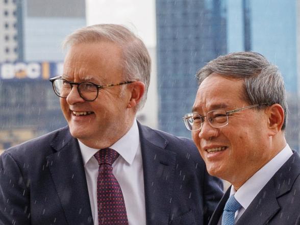 PERTH, AUSTRALIA - JUNE 18: Australian Prime Minister Anthony Albanese and Chinese Premier Li Qiang shake hands while at the Kaarta Gar-up Lookout in Kings Park before the Australia-China CEO Roundtable on June 18, 2024 in Perth, Australia. Li's visit to Australia aims to strengthen bilateral ties and address outstanding trade and consular issues, including the removal of remaining trade barriers and the release of imprisoned Australian democracy blogger Yang Hengjuno, marking a significant step towards stabilizing the relationship between the two nations. The visit also highlights the growing importance of economic cooperation and the need for dialogue on security concerns, particularly in the context of China's increasing influence in the Pacific region. The visit marks the first high-level diplomatic outreach by a Chinese leader to Australia since 2017. (Photo by Richard Wainwright - Pool/Getty Images)