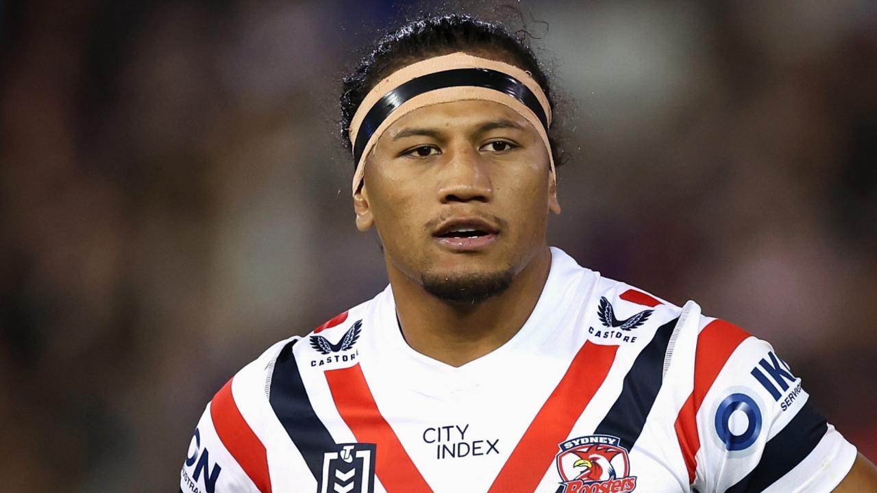 NEWCASTLE, AUSTRALIA - APRIL 11: Sitili Tupouniua of the Roosters leaves the field for an HIA during the round six NRL match between Newcastle Knights and Sydney Roosters at McDonald Jones Stadium, on April 11, 2024, in Newcastle, Australia. (Photo by Cameron Spencer/Getty Images)