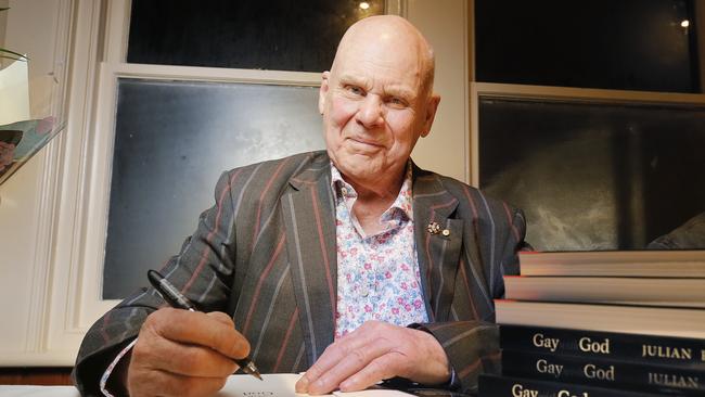 Julian Punch signing copies of his book, Gay with God: The Life and Times of a Turbulent Priest. Picture: MATHEW FARRELL