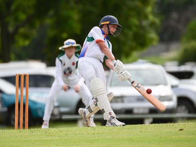 Oliver Boge drives the ball out of the middle of the bat.