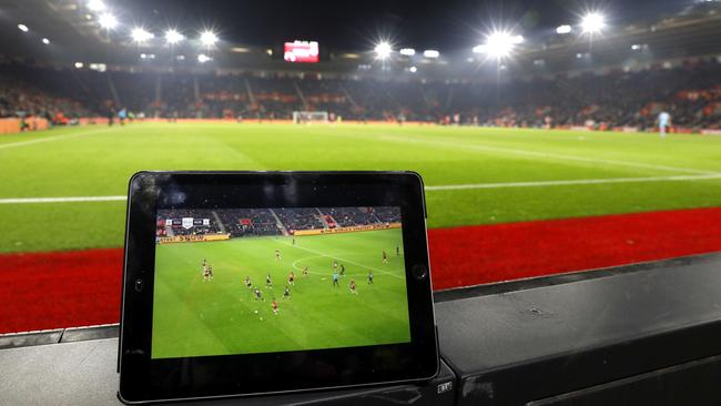 The English Premier League soccer match between Southampton and Norwich, is being streamed live on a screen via Amazon Prime at St Mary’s. Picture: PA via AP