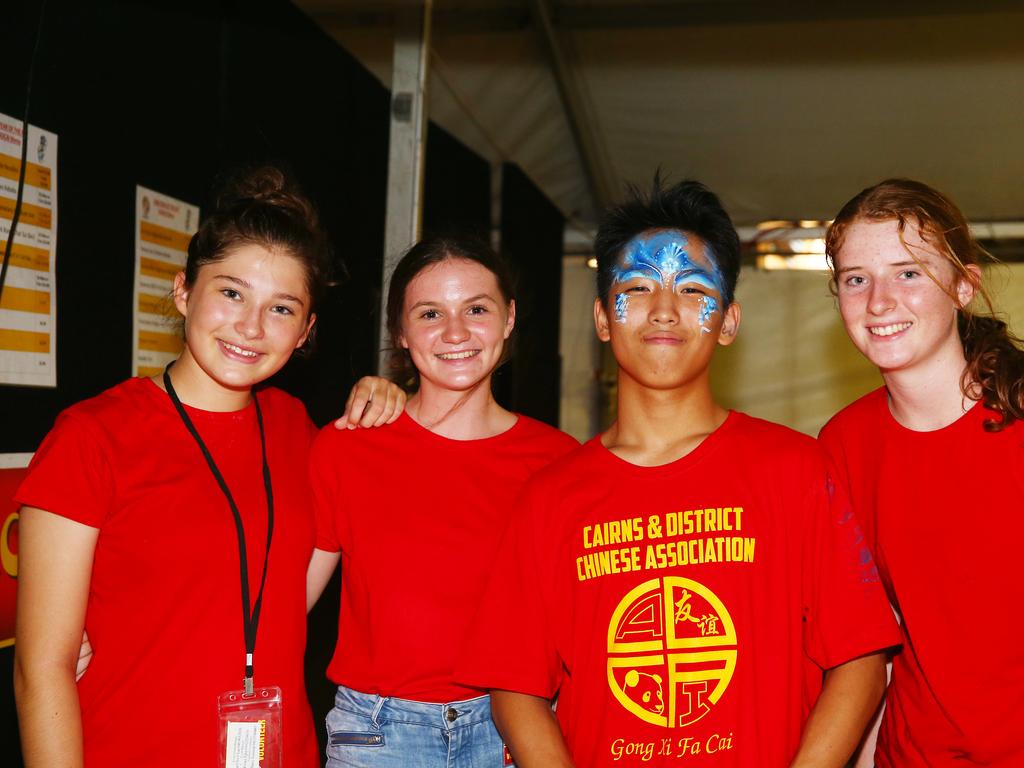 Chelsea Cross, Hailey Lynch, Jackson Ma and Ash Seivers at the Cairns and District Chinese Association Inc Chinese New Year street festival on Grafton Street. PICTURE: BRENDAN RADKE