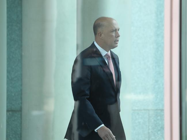 Peter Dutton walking to the party room meeting at Parliament House in Canberra. Picture Kym Smith