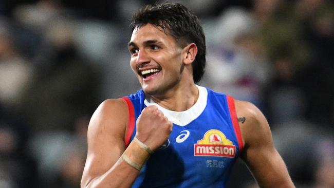 GEELONG, AUSTRALIA - JULY 20: Jamarra Ugle-Hagan of the Bulldogs celebrates kicking a goal during the round 19 AFL match between Geelong Cats and Western Bulldogs at GMHBA Stadium, on July 20, 2024, in Geelong, Australia. (Photo by Daniel Pockett/Getty Images)