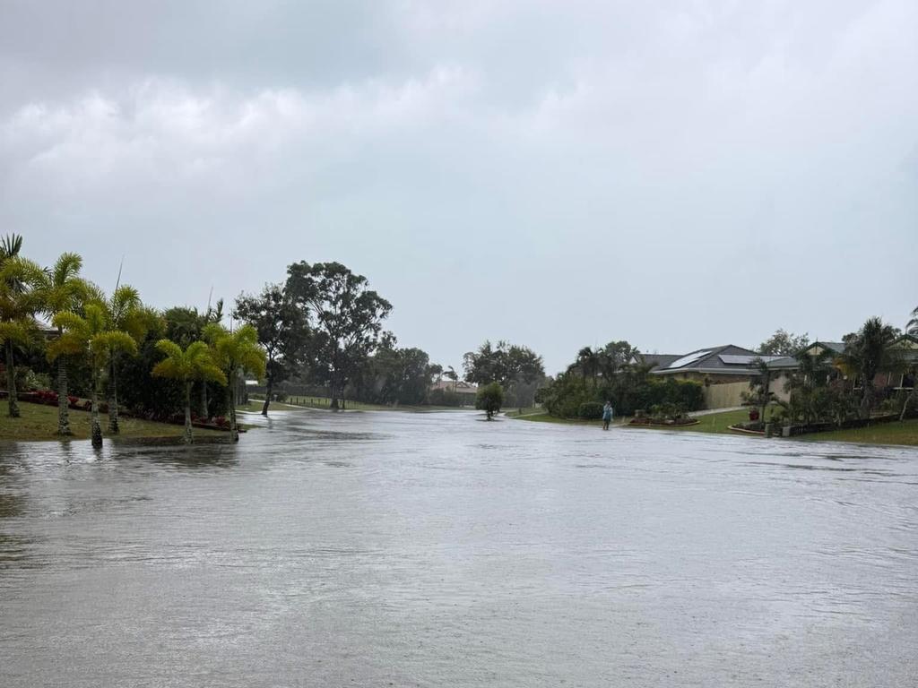 Flooding on Ibis Boulevard in Eli Waters during the wild weather brought by ex-Tropical Cyclone Alfred. Photo: Chris Bergin
