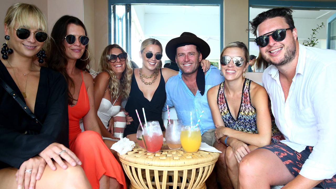 Karl and Jasmine (centre) with Jade Yarbrough (left) and friends at the luxury Rae’s resort at Wategos Beach, Byron Bay.