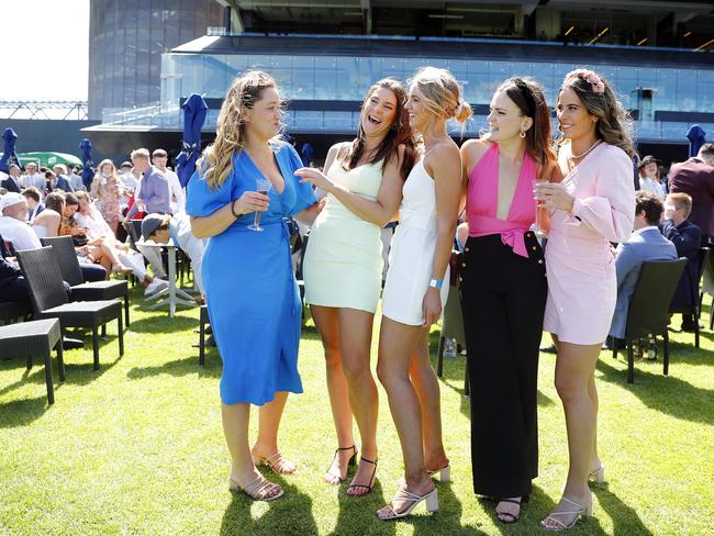 Punters L to R, Amy Harrison, Amy Sherlock, Rebecca Fuchs, Emily Hart and Stef O'Grady enjoy the sunshine at The Everest. Picture: Sam Ruttyn