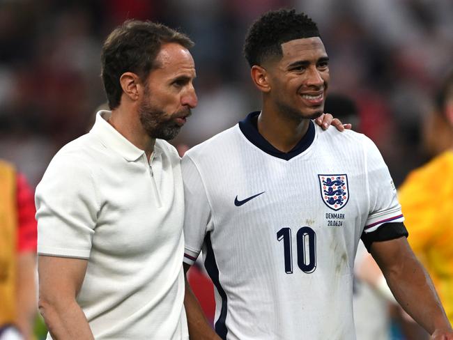 FRANKFURT AM MAIN, GERMANY - JUNE 20: Gareth Southgate, Head Coach of England, embraces Jude Bellingham after the UEFA EURO 2024 group stage match between Denmark and England at Frankfurt Arena on June 20, 2024 in Frankfurt am Main, Germany. (Photo by Stu Forster/Getty Images)