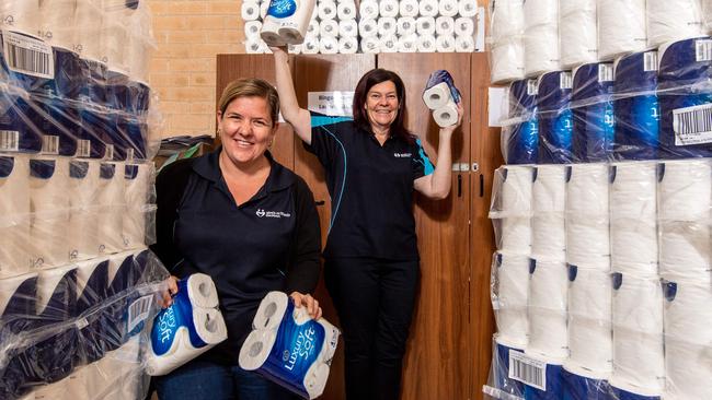 Amber Bulbert and Rebecca Waterhouse pictured with a special toilet paper delivery at Blacktown Meals on Wheels. Picture: Monique Harmer