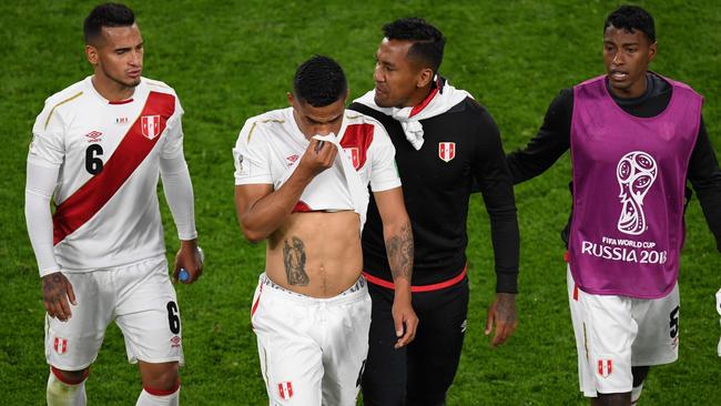 Peru players leave the field after losing to France. Picture: AFP Photo