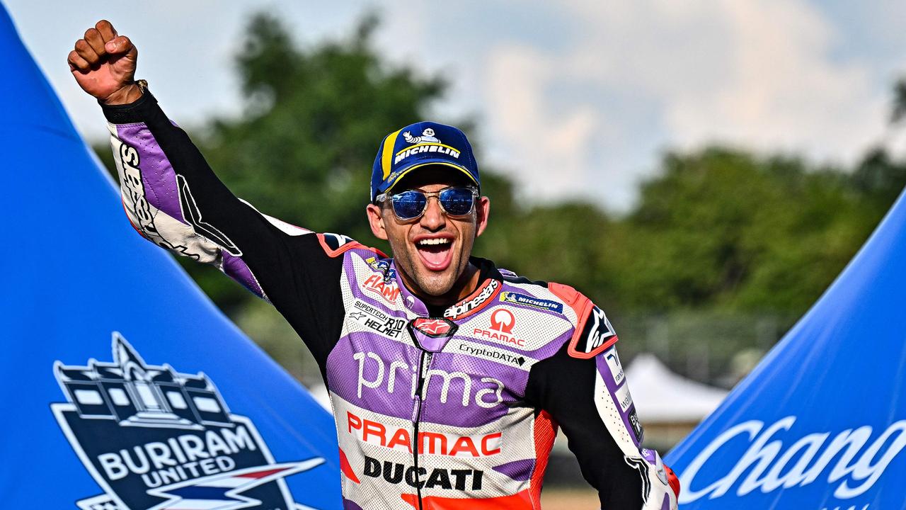 TOPSHOT - Winner Prima Pramac's Spanish rider Jorge Martin celebrates on the podium after the MotoGP Thailand Grand Prix at the Buriram International Circuit in Buriram on October 29, 2023. (Photo by Lillian SUWANRUMPHA / AFP)