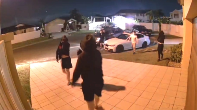 A youth gang in a stolen car convoy caught on camera scoping out homes at Runaway Bay. Picture: Supplied.